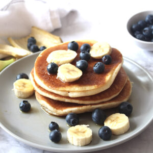 coconut milk pancakes with blueberries and bananas